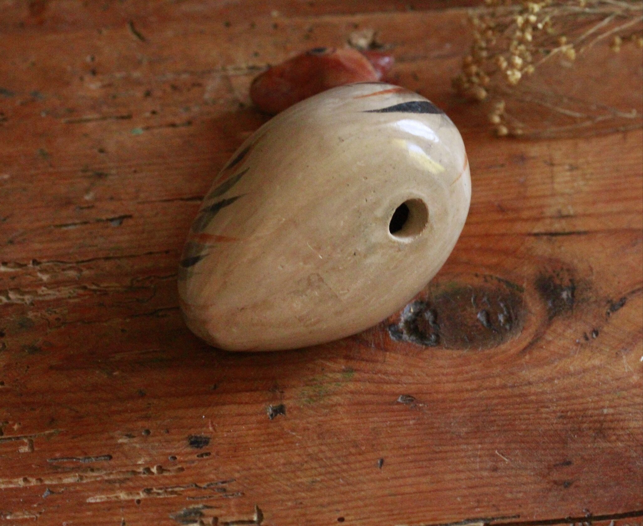 Ancient Mexican bird statue in ceramic