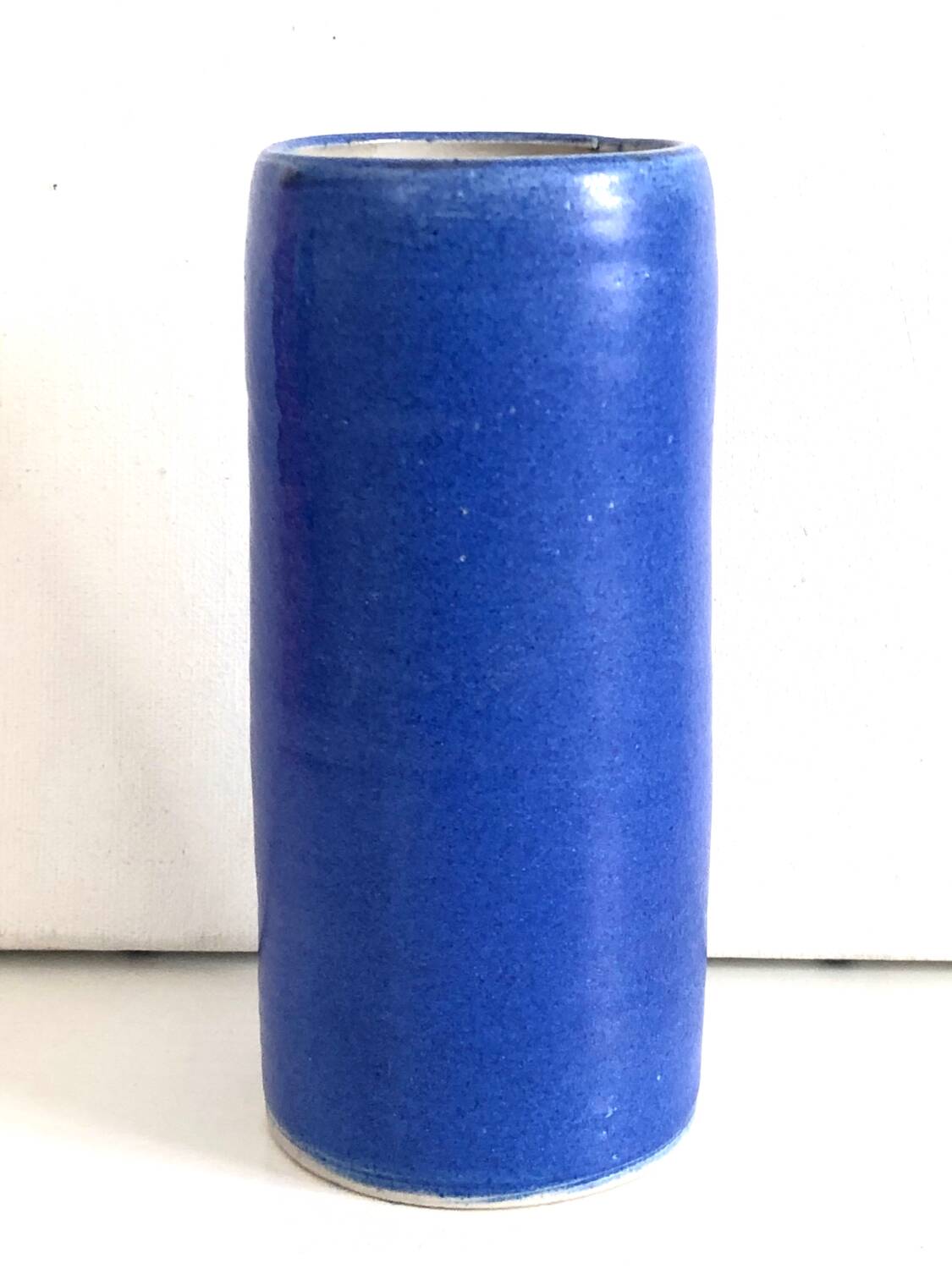 Blue ceramic cylinder vase