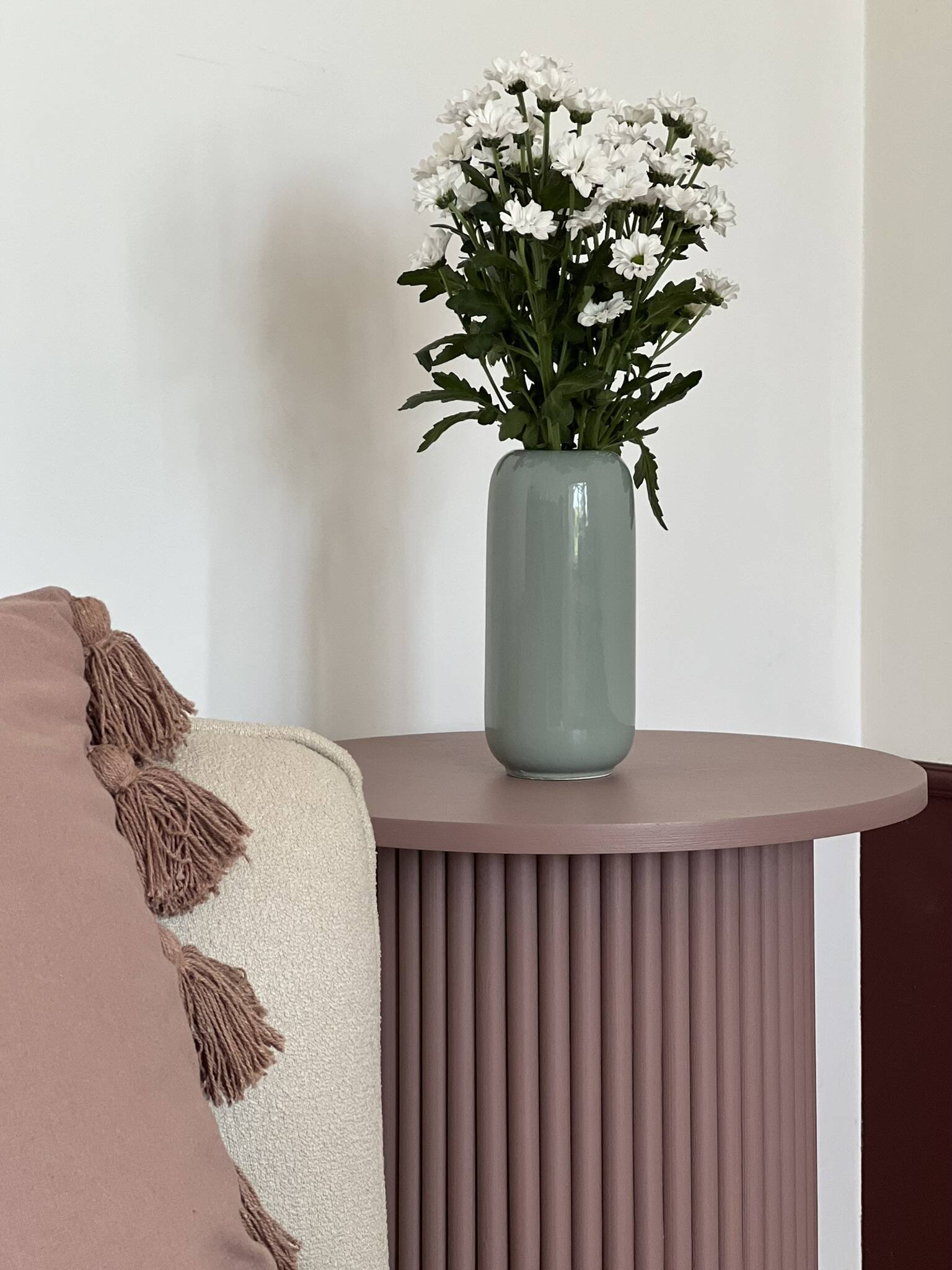 round and fluted side table in mauve, dimmed pink purple