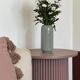 round and fluted side table in mauve, dimmed pink purple