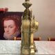 Fireplace trim clock and adornment of antique bronze candelabra