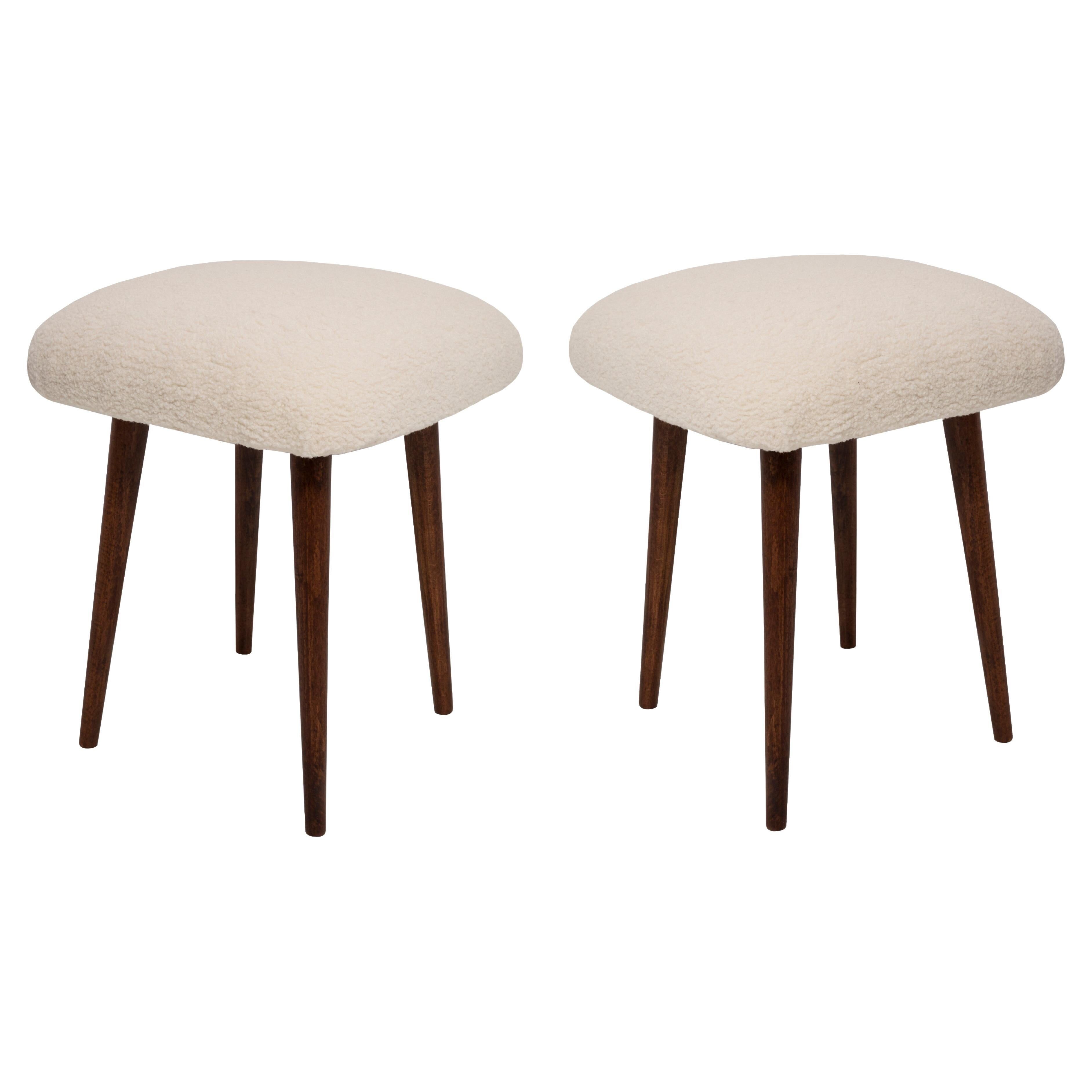 Set of two mid-century modern light beige boucle stools, Europe, 1960s.