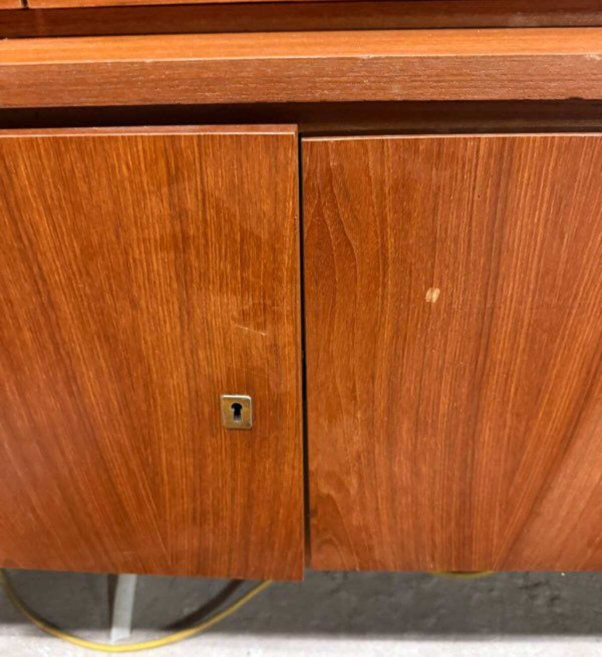 Vintage Scandinavian teak sideboard with compass feet from the 70s