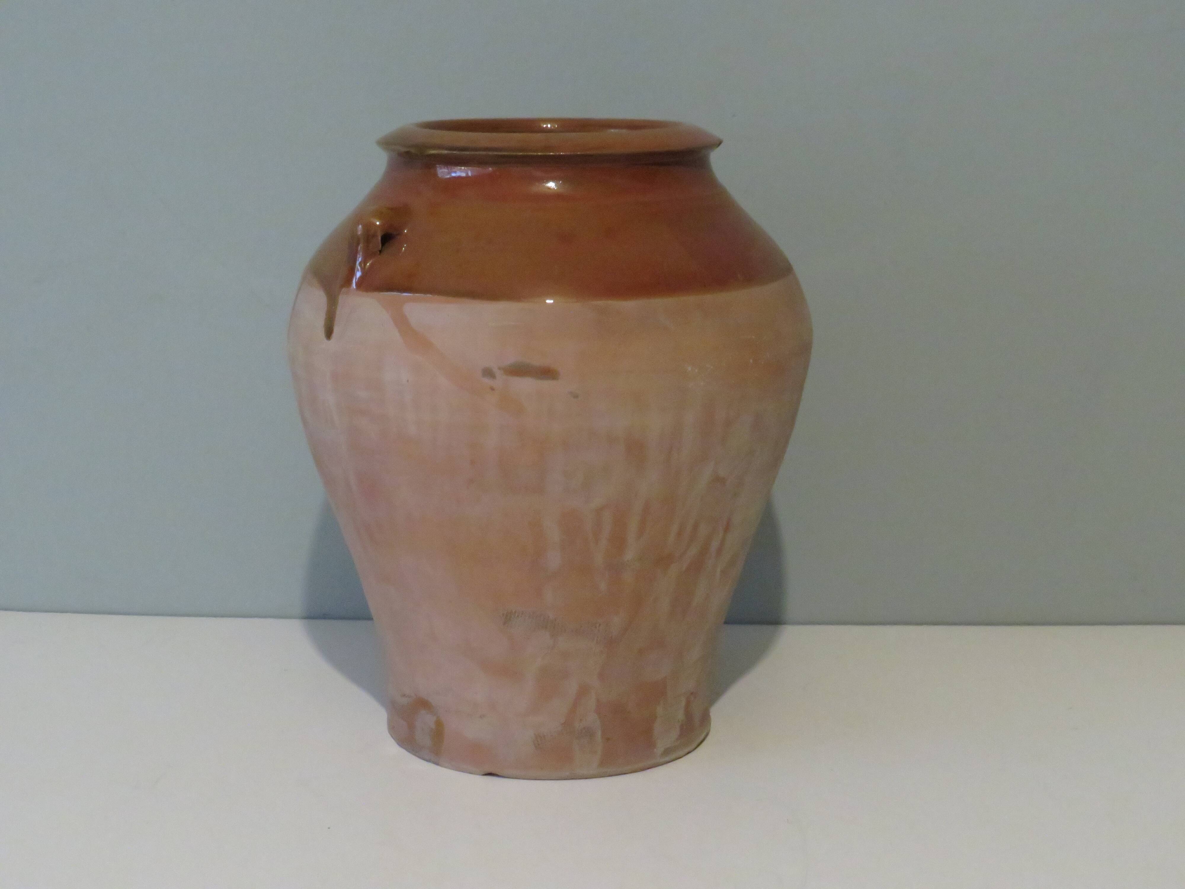 Ancient vase in natural terracotta