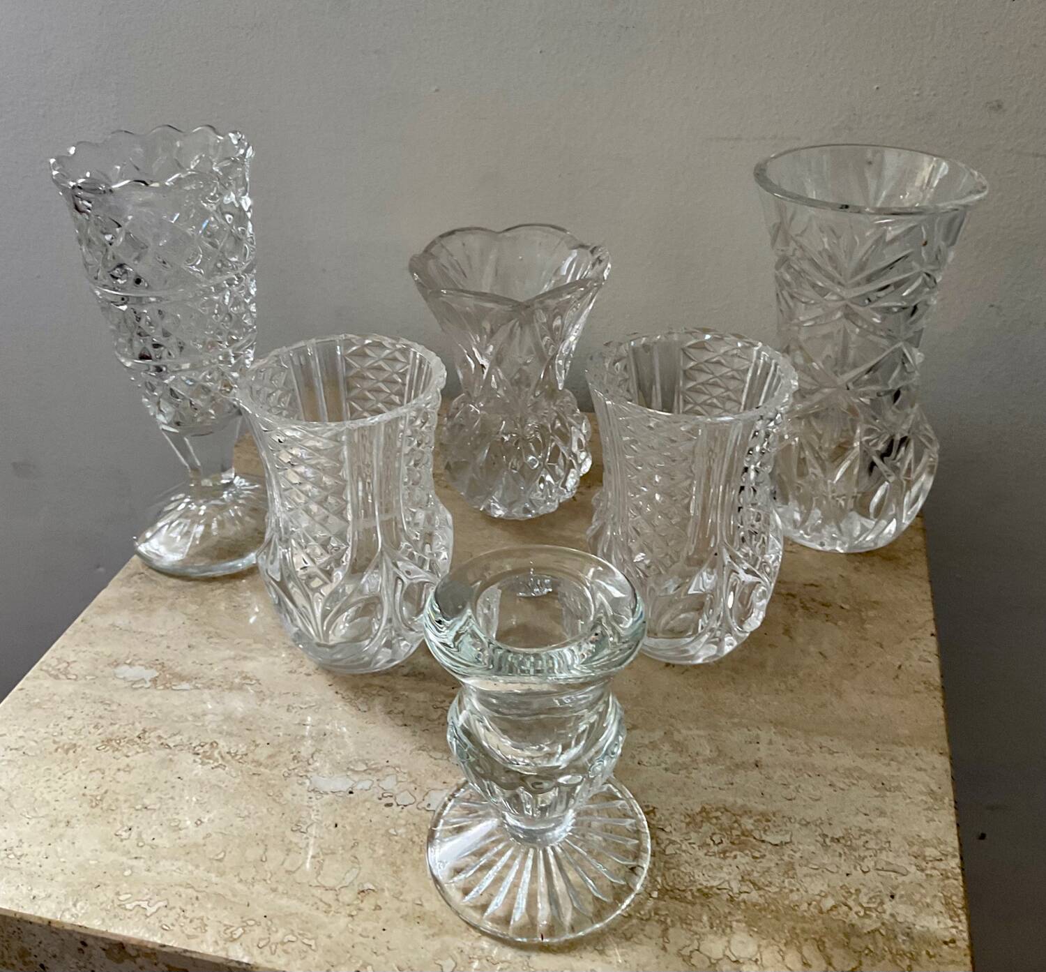 Series of 6 miniature vases in chiseled glass