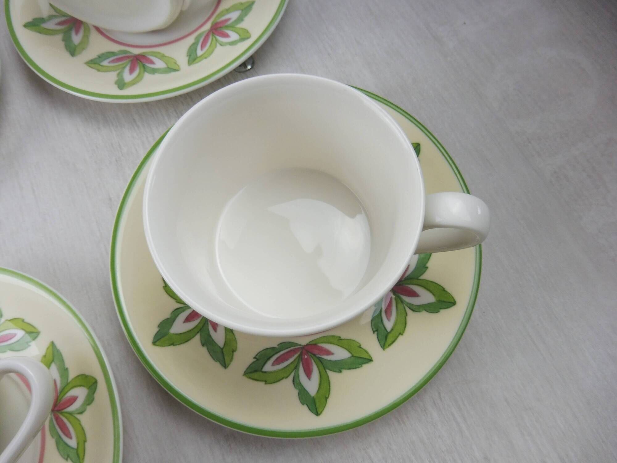 Lot 12 old cups under cups, Fiorita campagna décor, from Villeroy to Boch