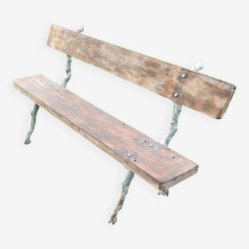 Beautiful old garden bench with cast iron legs