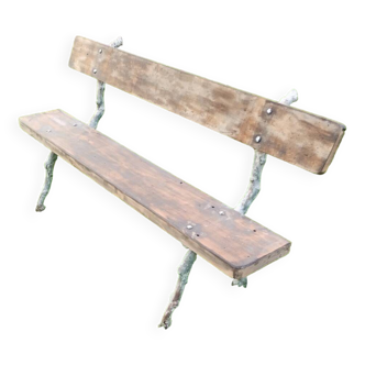 Beautiful old garden bench with cast iron legs