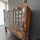 Antique wedding furniture from Rajasthan in carved wood, with inlays.