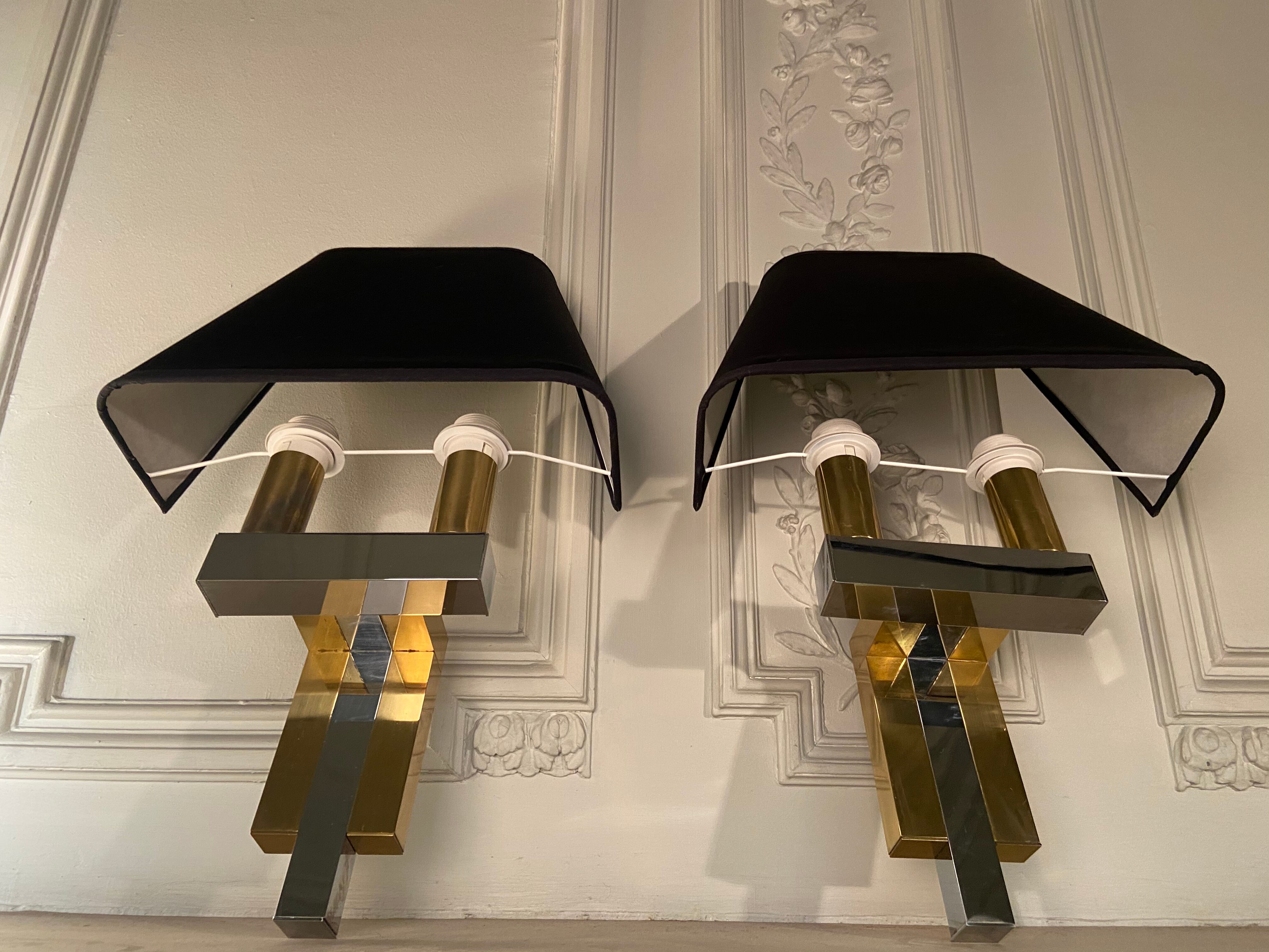 Pair of brass and chrome sconces