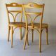 2 bistro chairs from 1905 by KOHN No. 187, wooden seats with 5 fleur-de-lis motifs