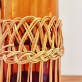 Amber and rattan bottle