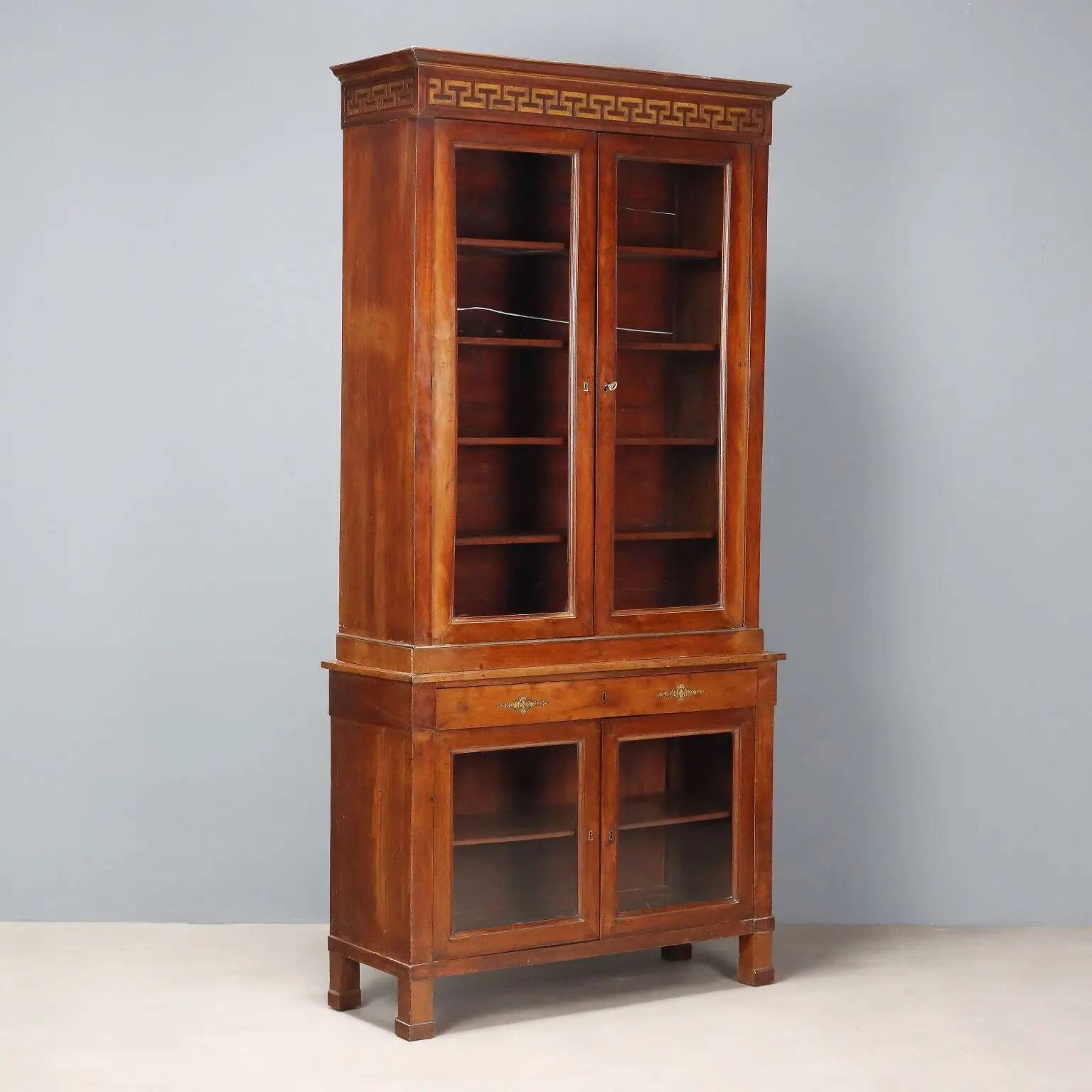 Empire display cabinet in walnut and bronze, Italy, 19th century