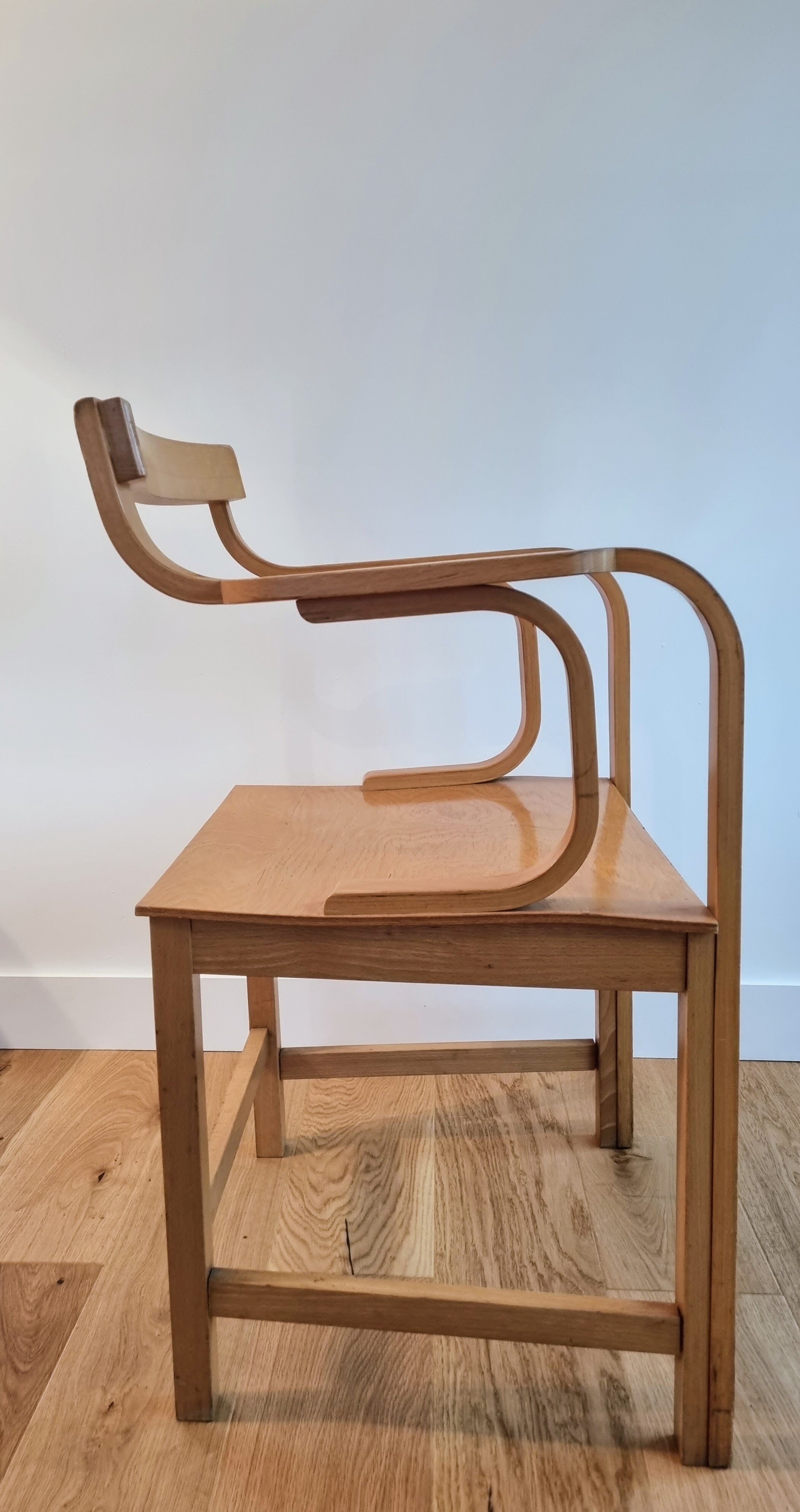 Vintage curved wood armchair