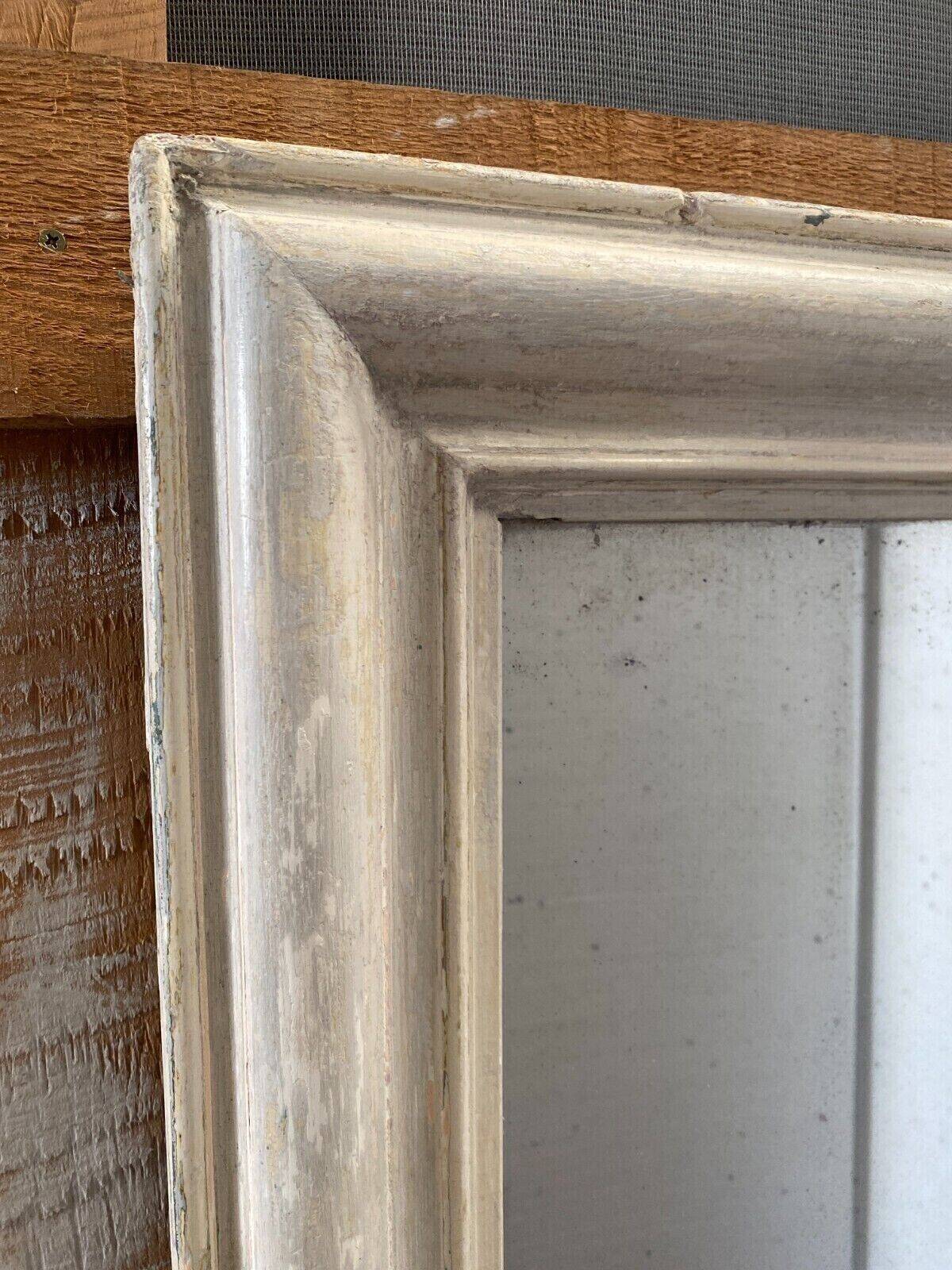 Louis Philippe mirror in wood and patinated stucco 19th century