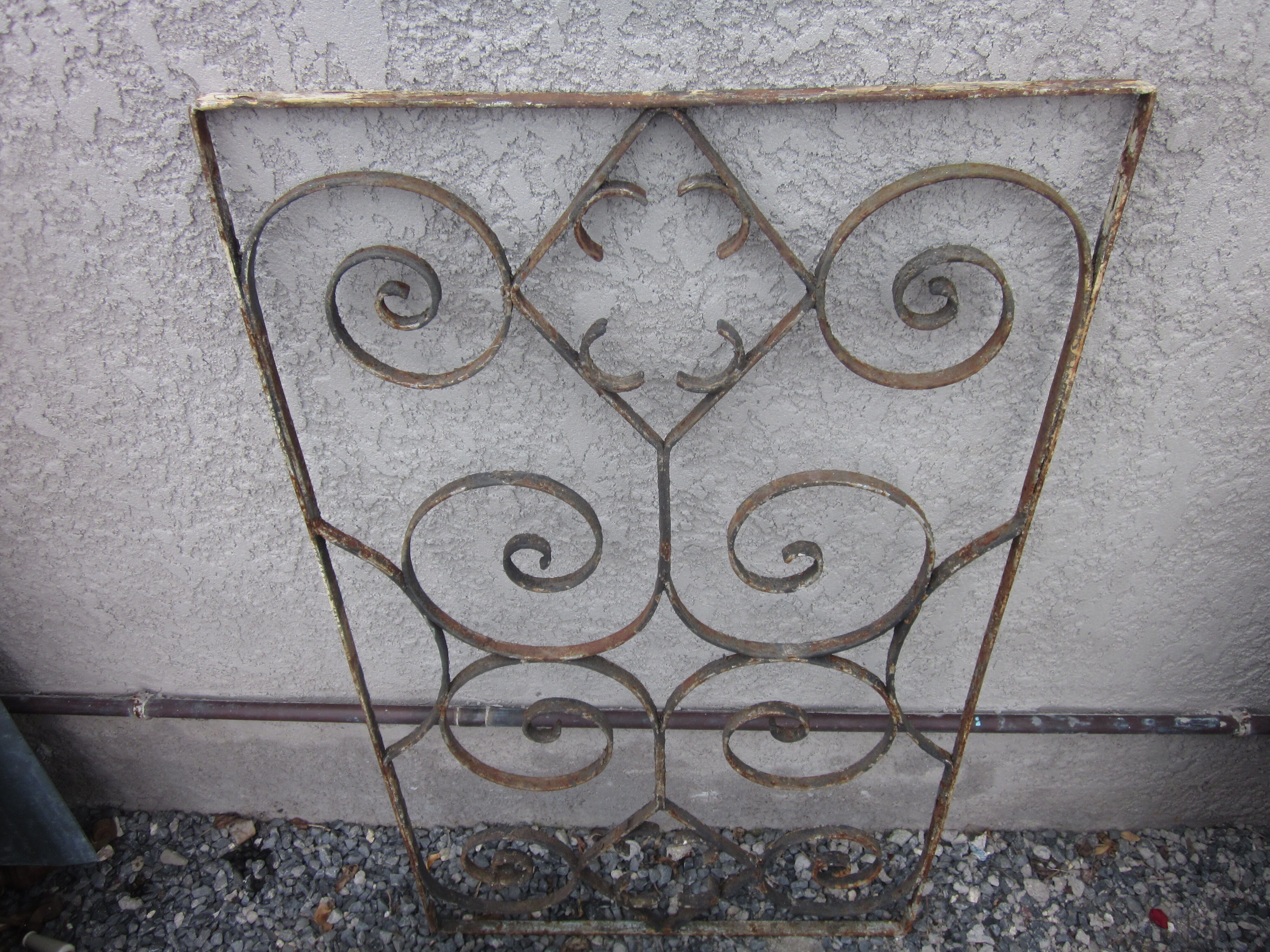 old wrought iron grid
