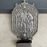 Small wall-mounted holy water font