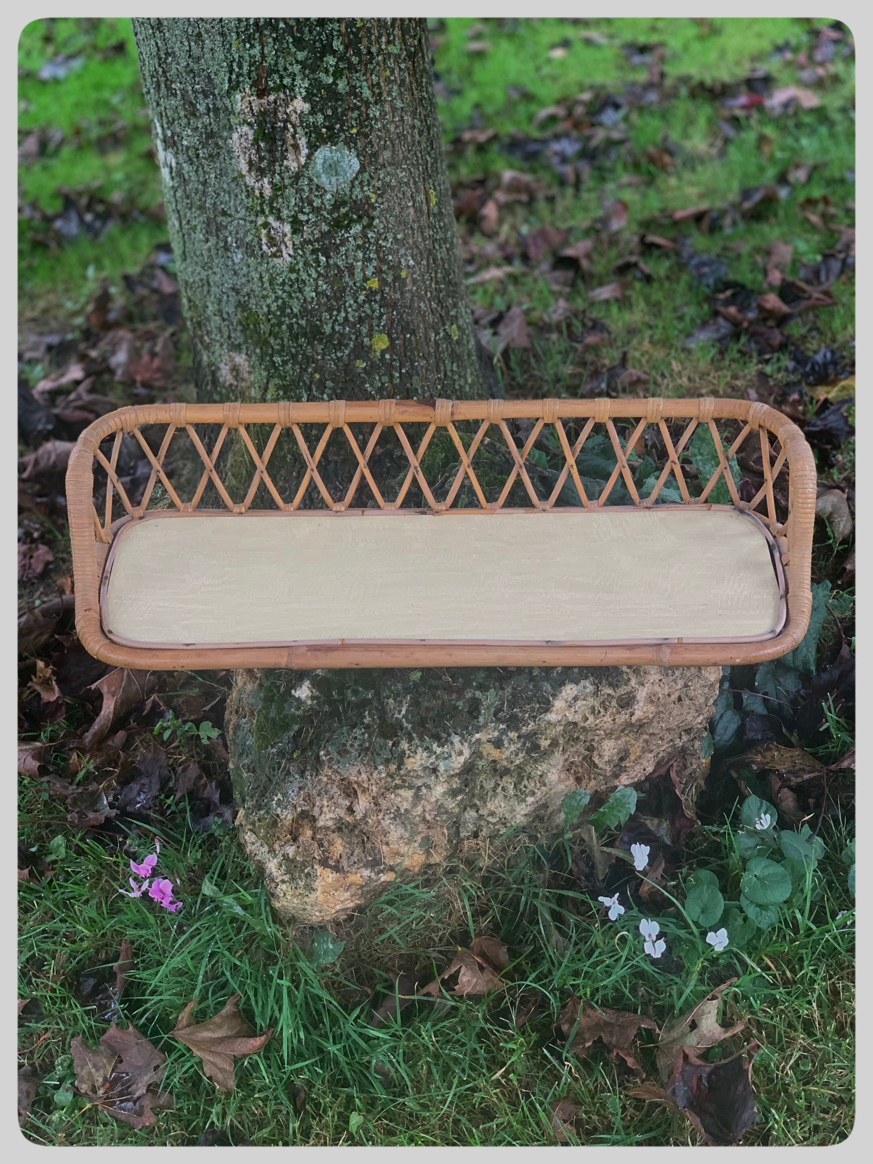 Antique rattan wall shelf