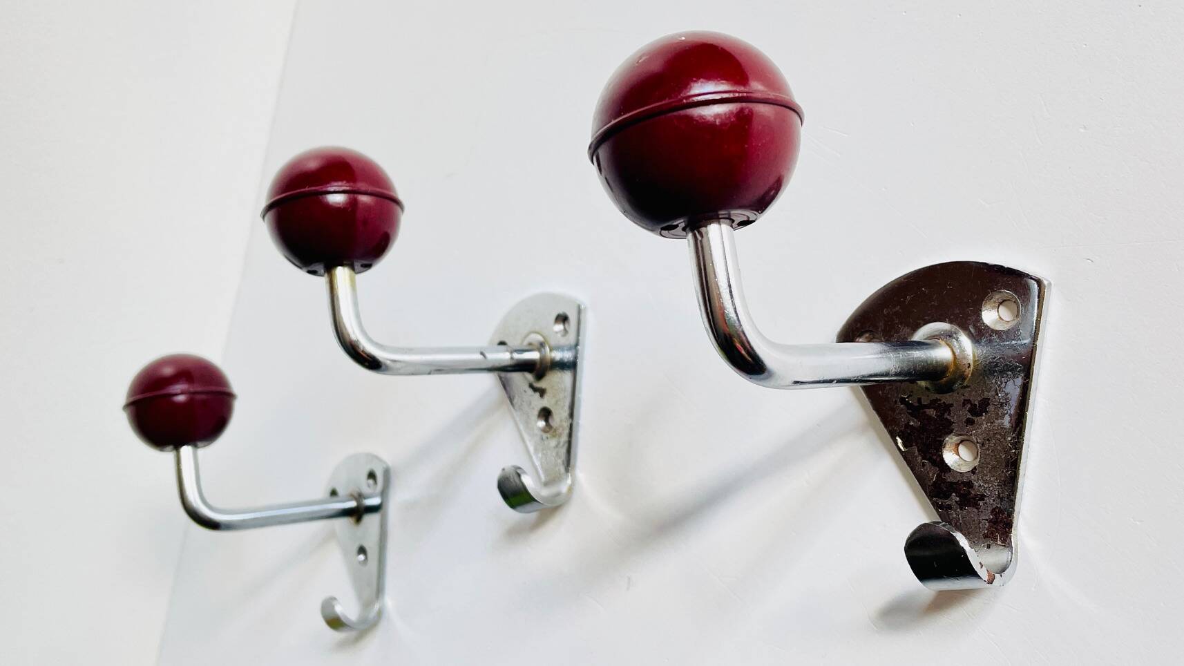 Chrome and bakelite coat hooks from the 70s