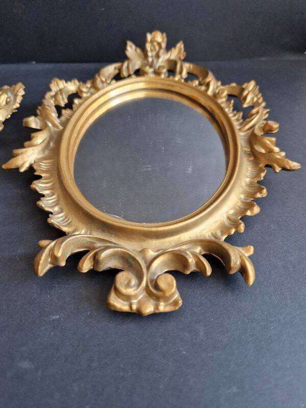 Pair of gilded rococo style mirrors, 1970s