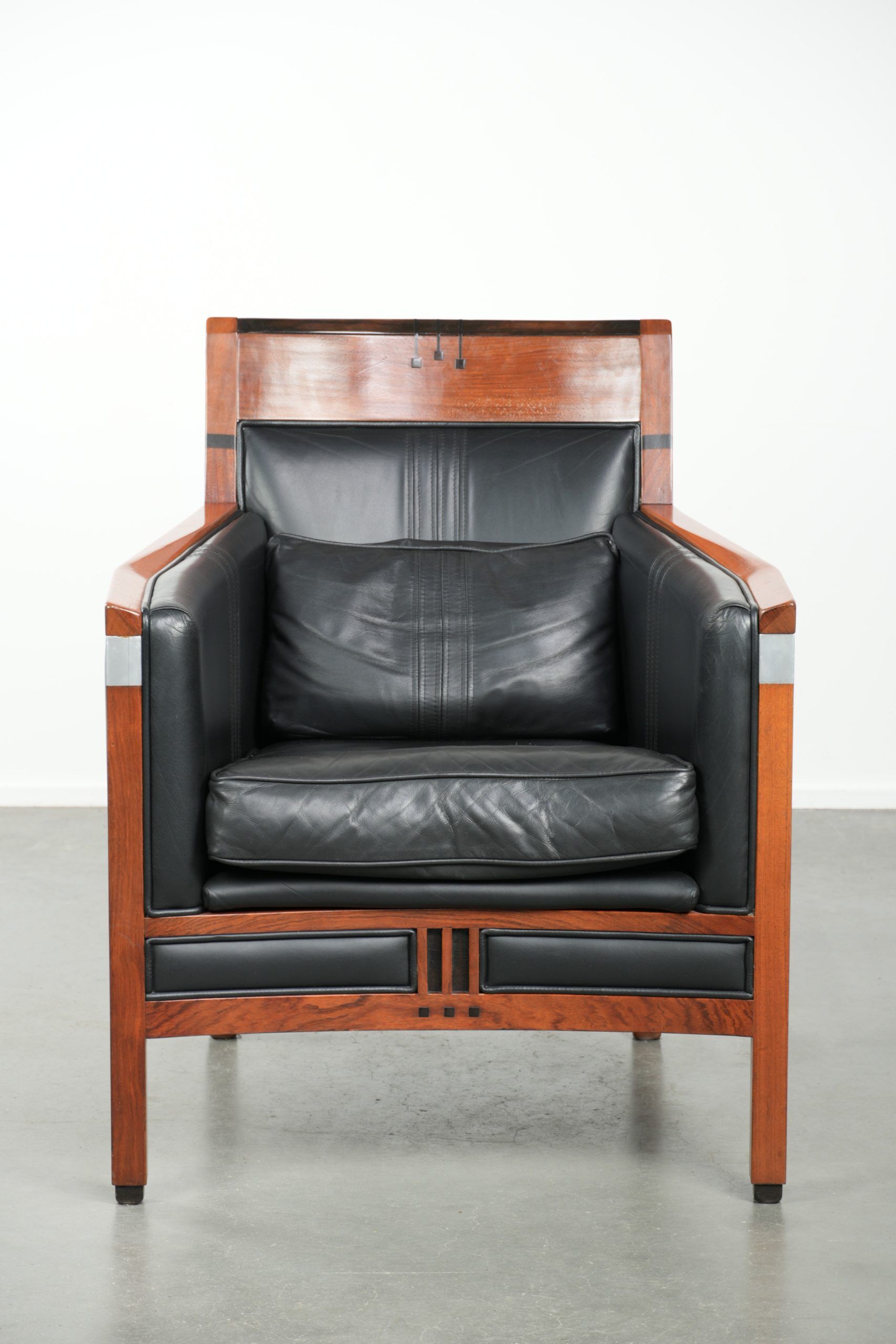 Black leather Art Deco design armchair in good condition