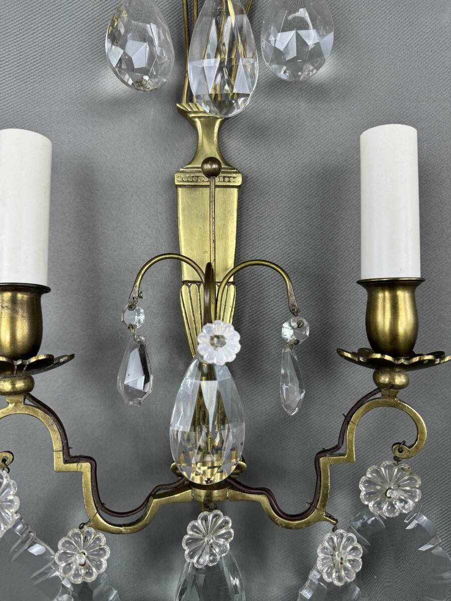 Pair of brass and crystal wall lights, 20th Century
