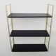 Vintage black and gold String design shelf. 60s