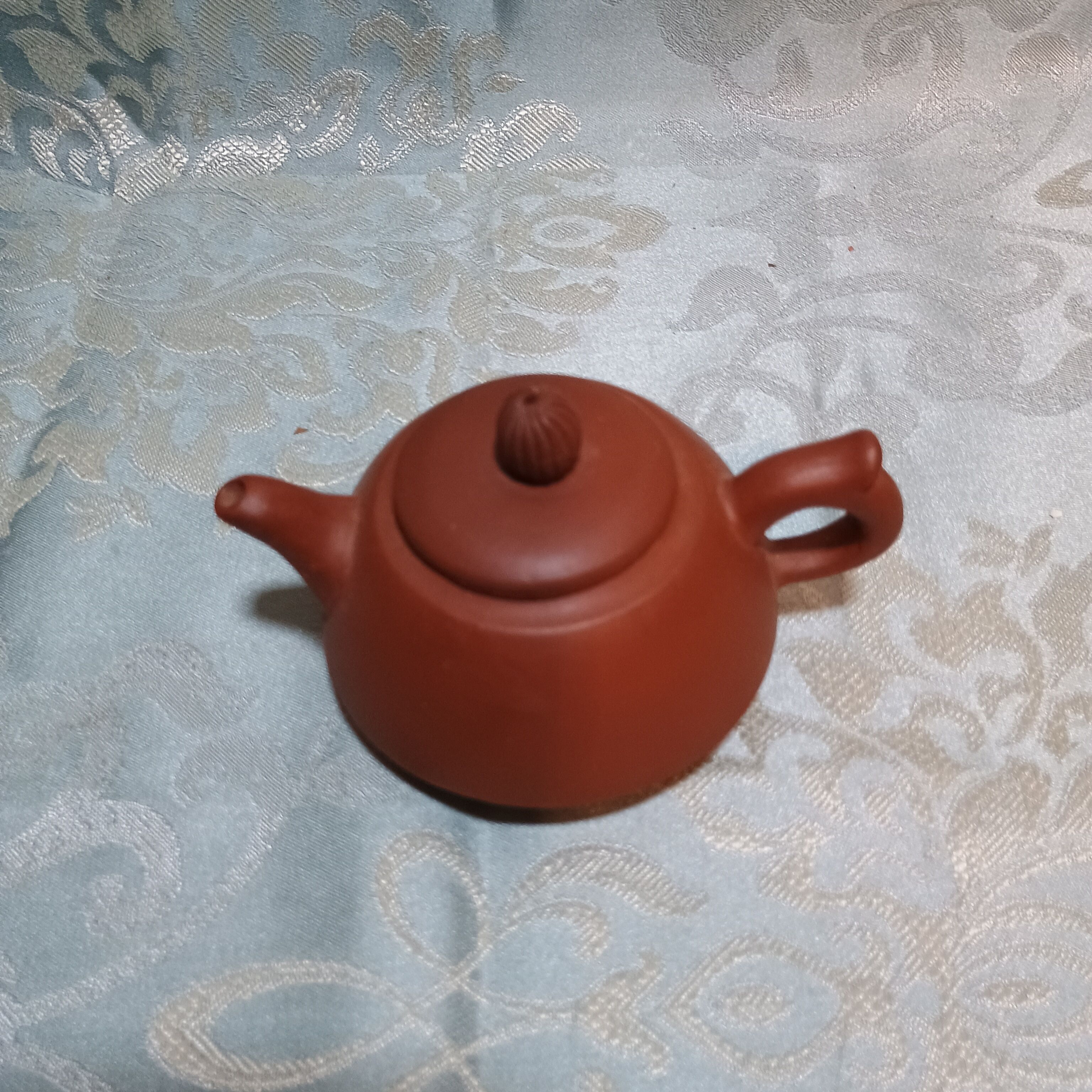 Yixing teapot in signed red clay