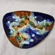 J. Capo enameled pocket emptier or dish from 1950