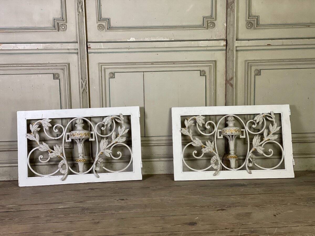 Pair of cast iron window shutters in Louis XVI style.