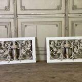 Pair of cast iron window shutters in Louis XVI style.