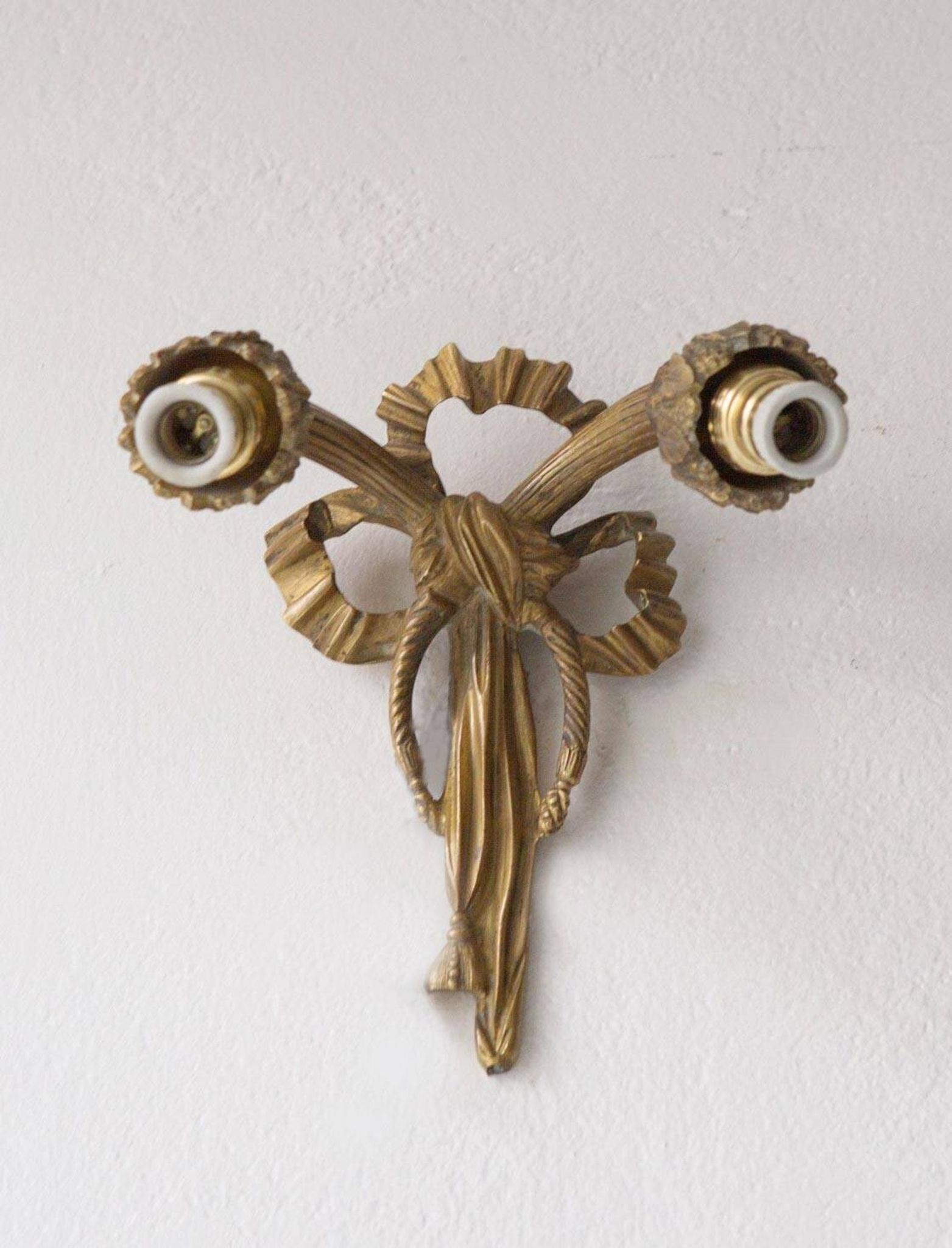 Pair of old French bronze wall lights from the beginning of the 20th century.