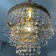 Chandelier with crystal and brass pendants