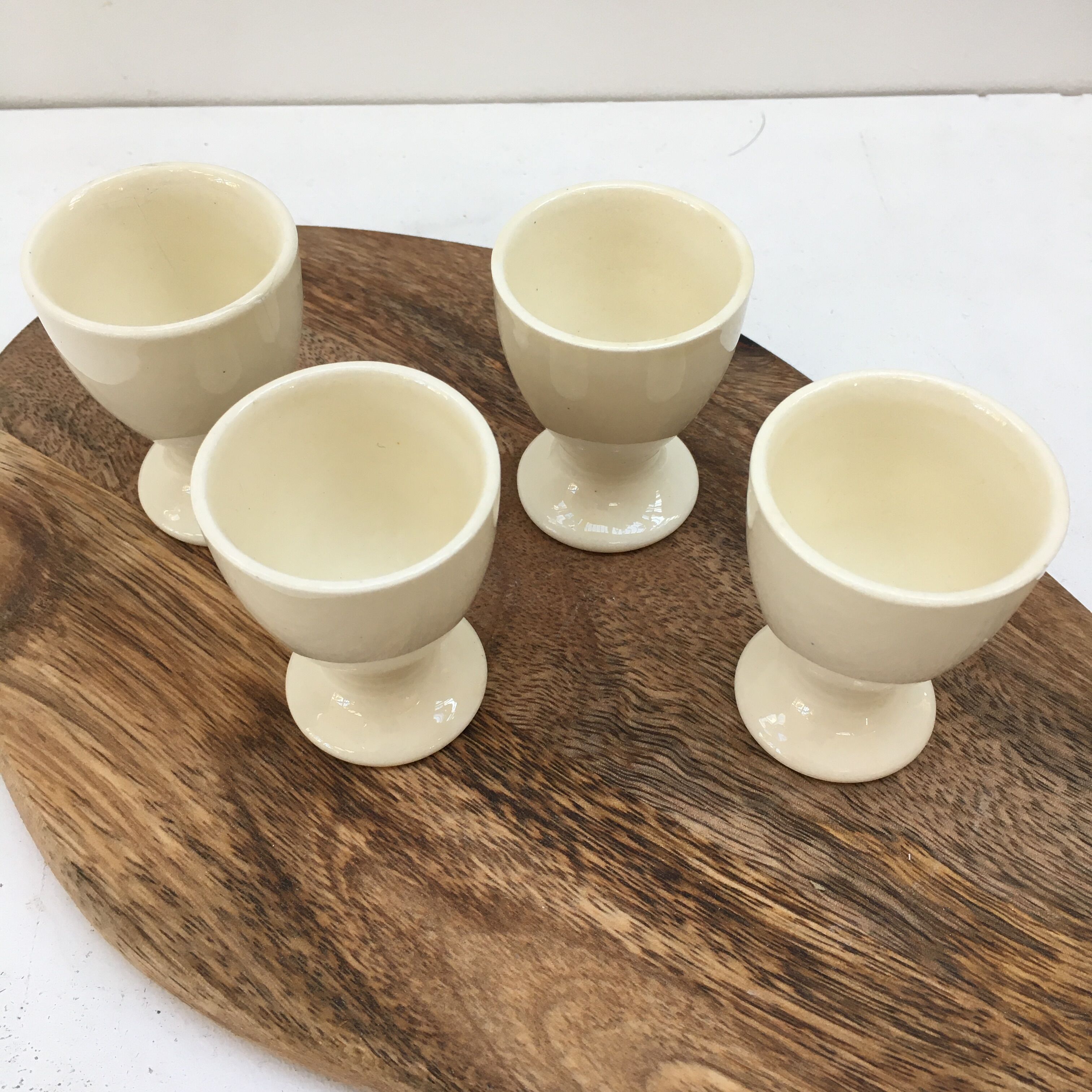 Series of four vintage ceramic coquetiers