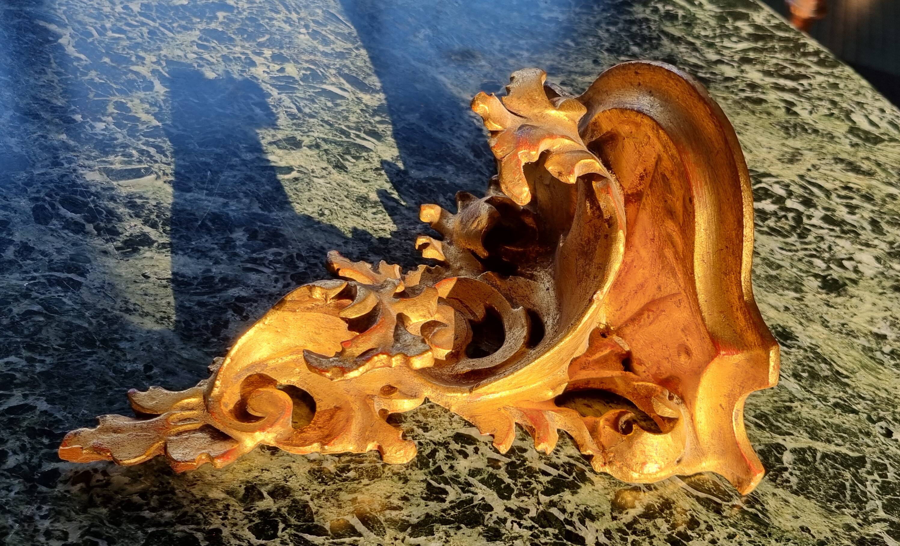 Golden wall shelf in Rococo style from the 1950s.