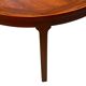 Round dining table in rosewood.