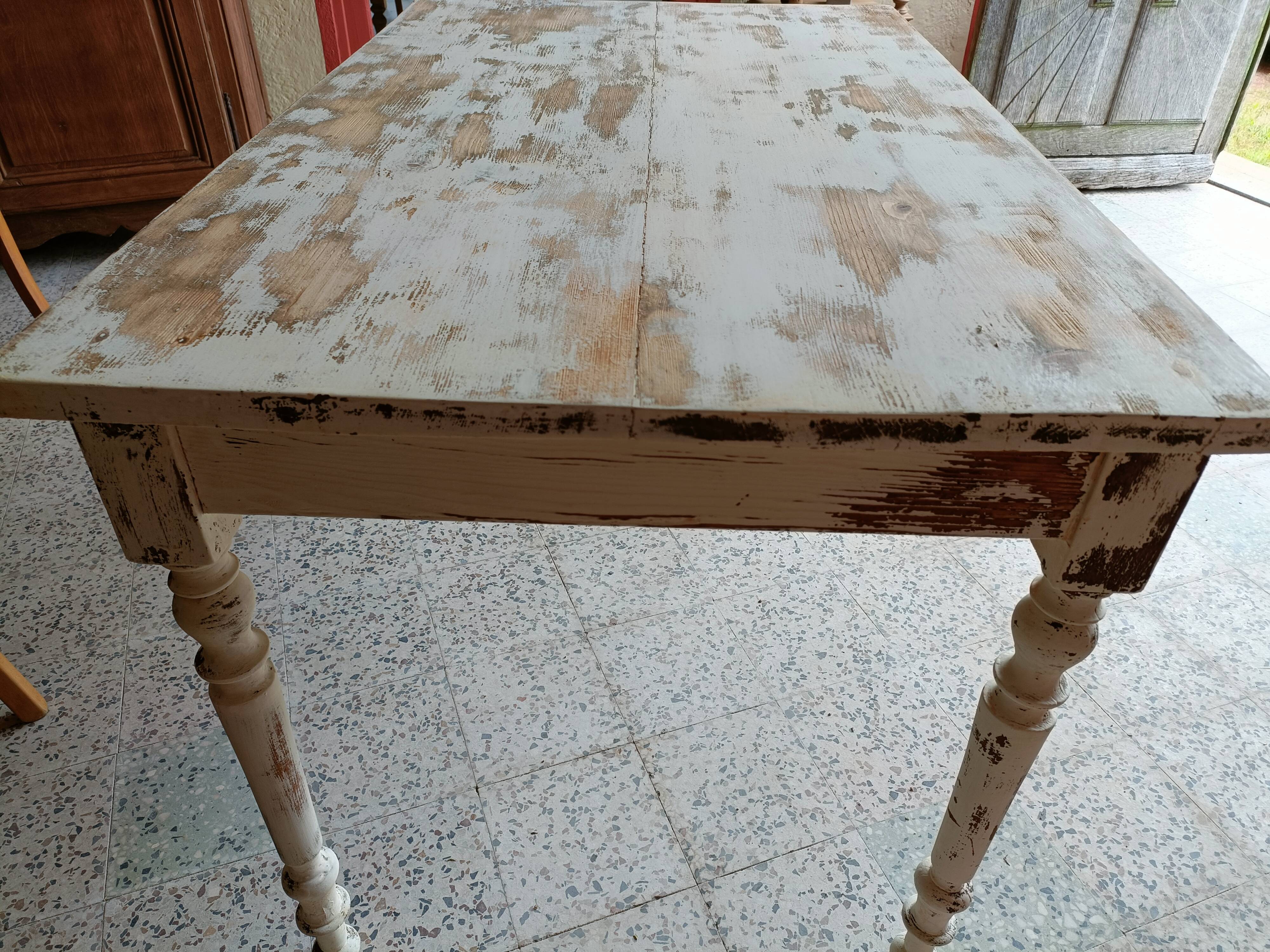 Patinated wooden table, restored.