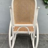Old rocking chair with white patina