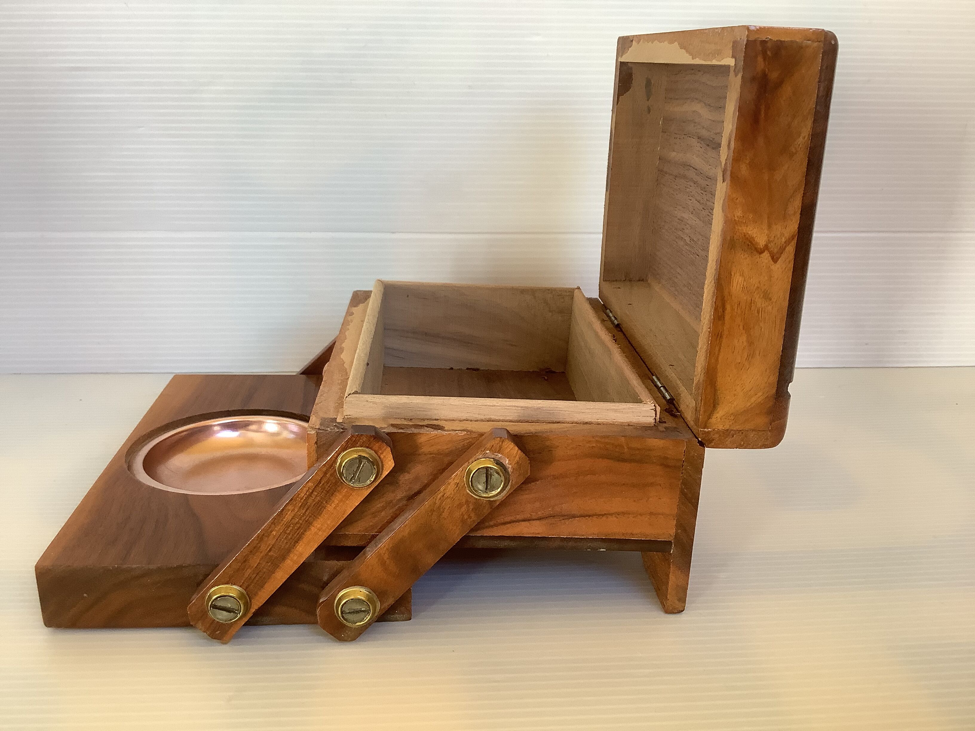 Old wooden cigarette box and ashtray