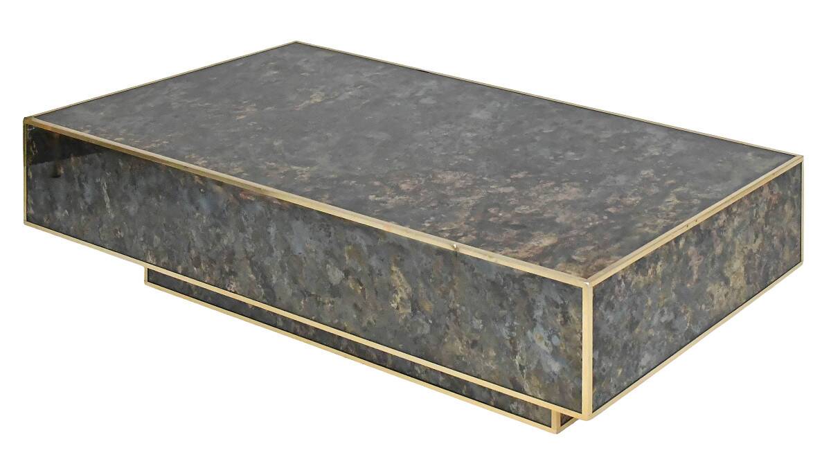 Marble glass coffee table with "solar eruption" decor.