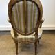 Fauteuil cabriolet médaillon de style Louis XVI