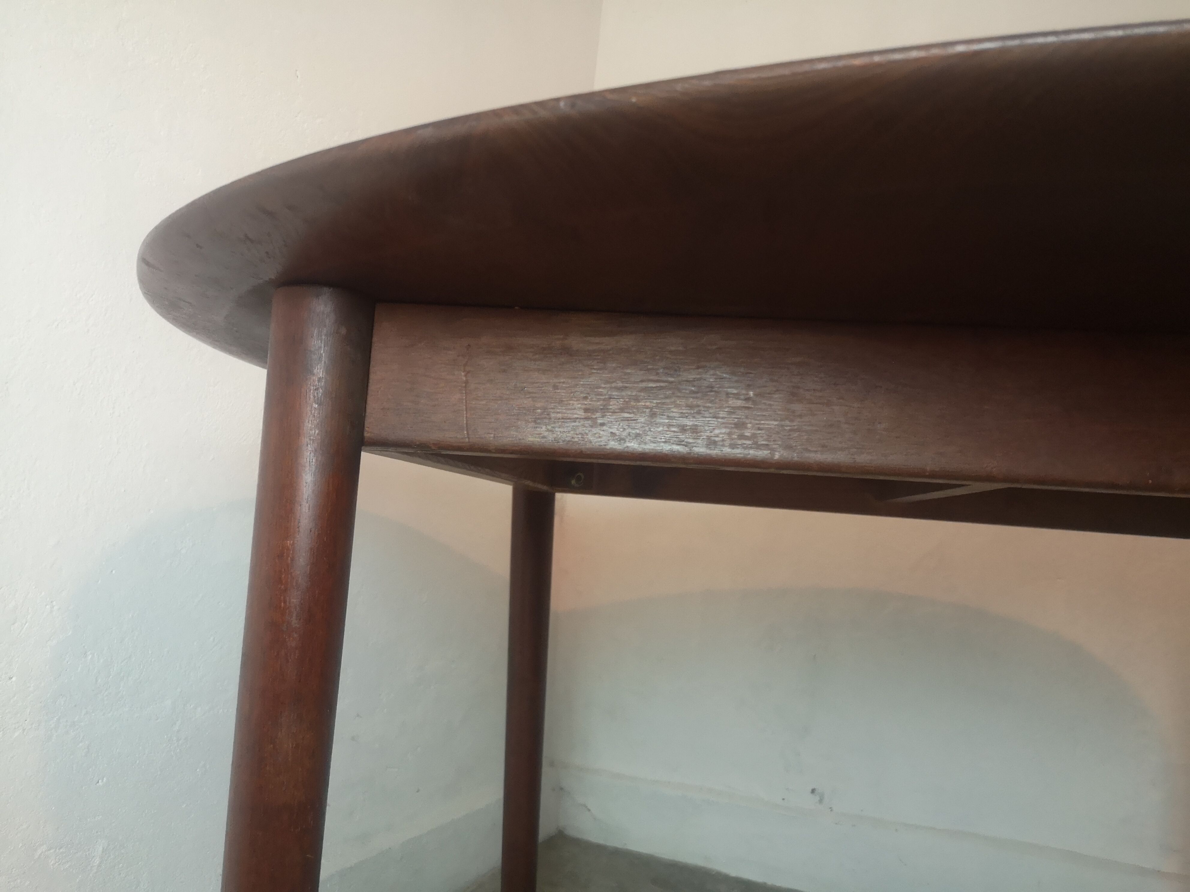 Scandinavian extendable round dining table in teak