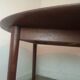 Scandinavian extendable round dining table in teak