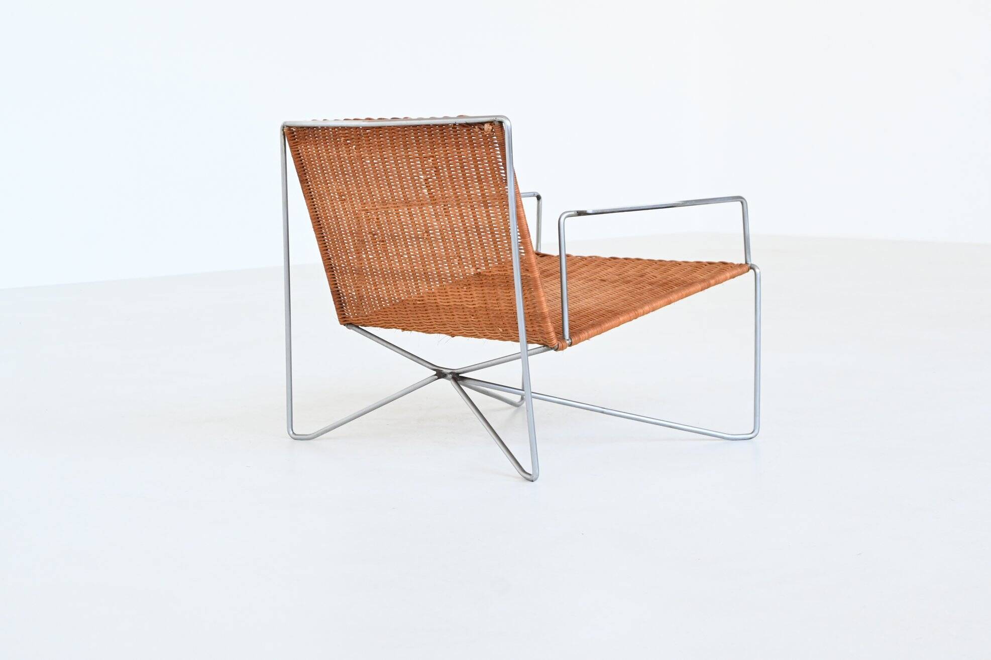Pair of lounge chairs steel and rattan Gelderland The Netherlands 1964