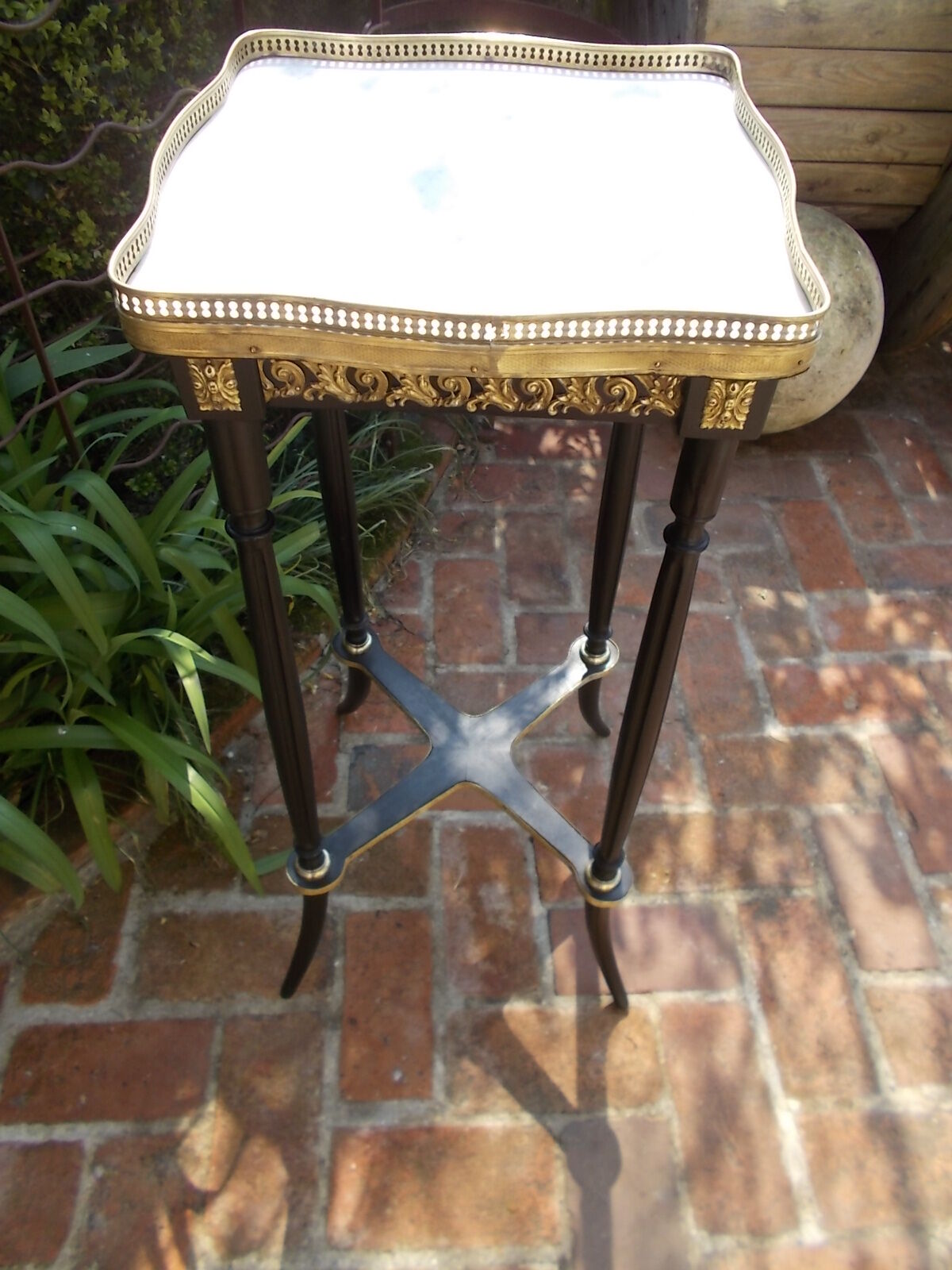 Napoleon III side table with marble top and openwork gallery.