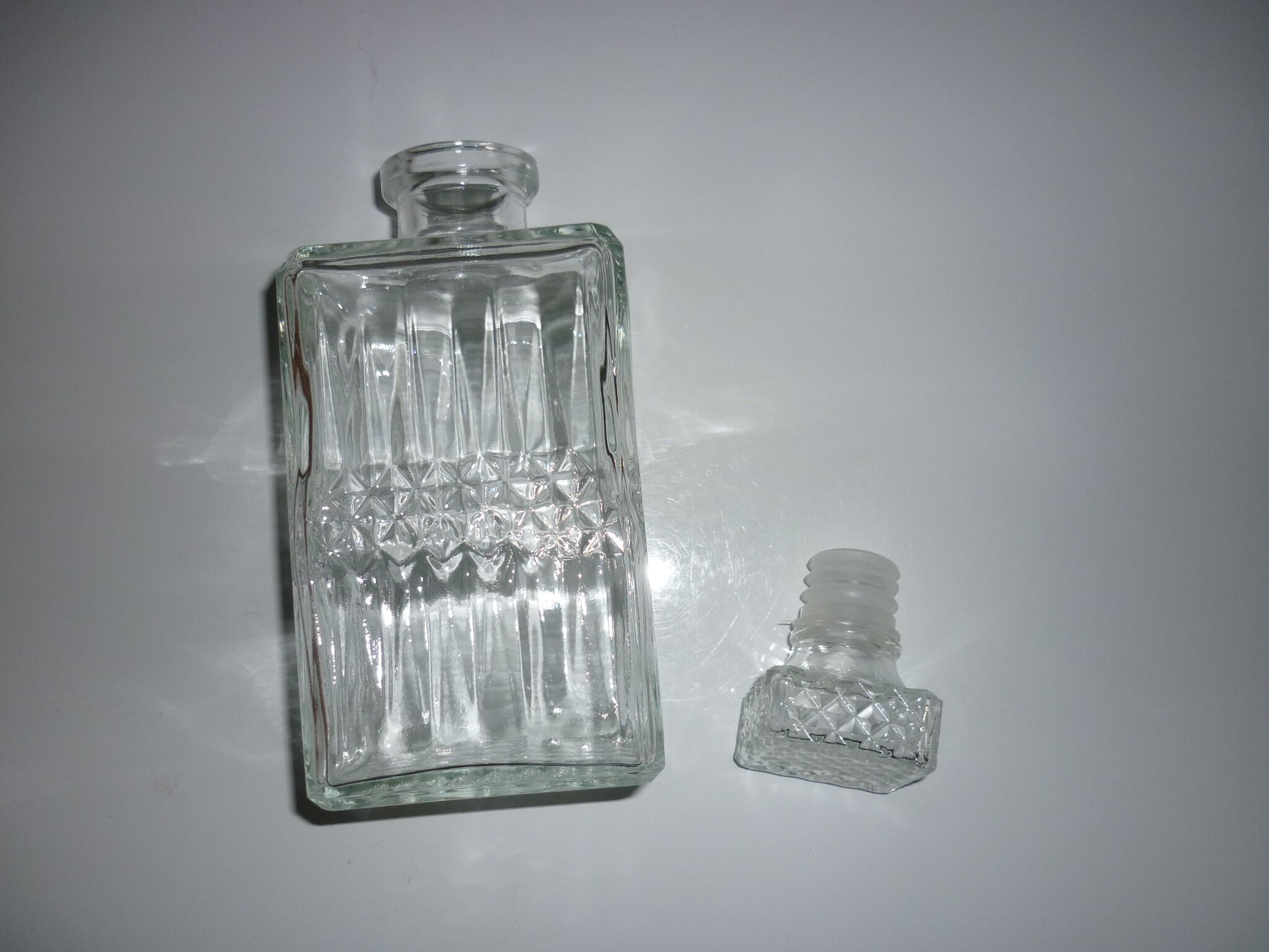 Square cap glass carafe