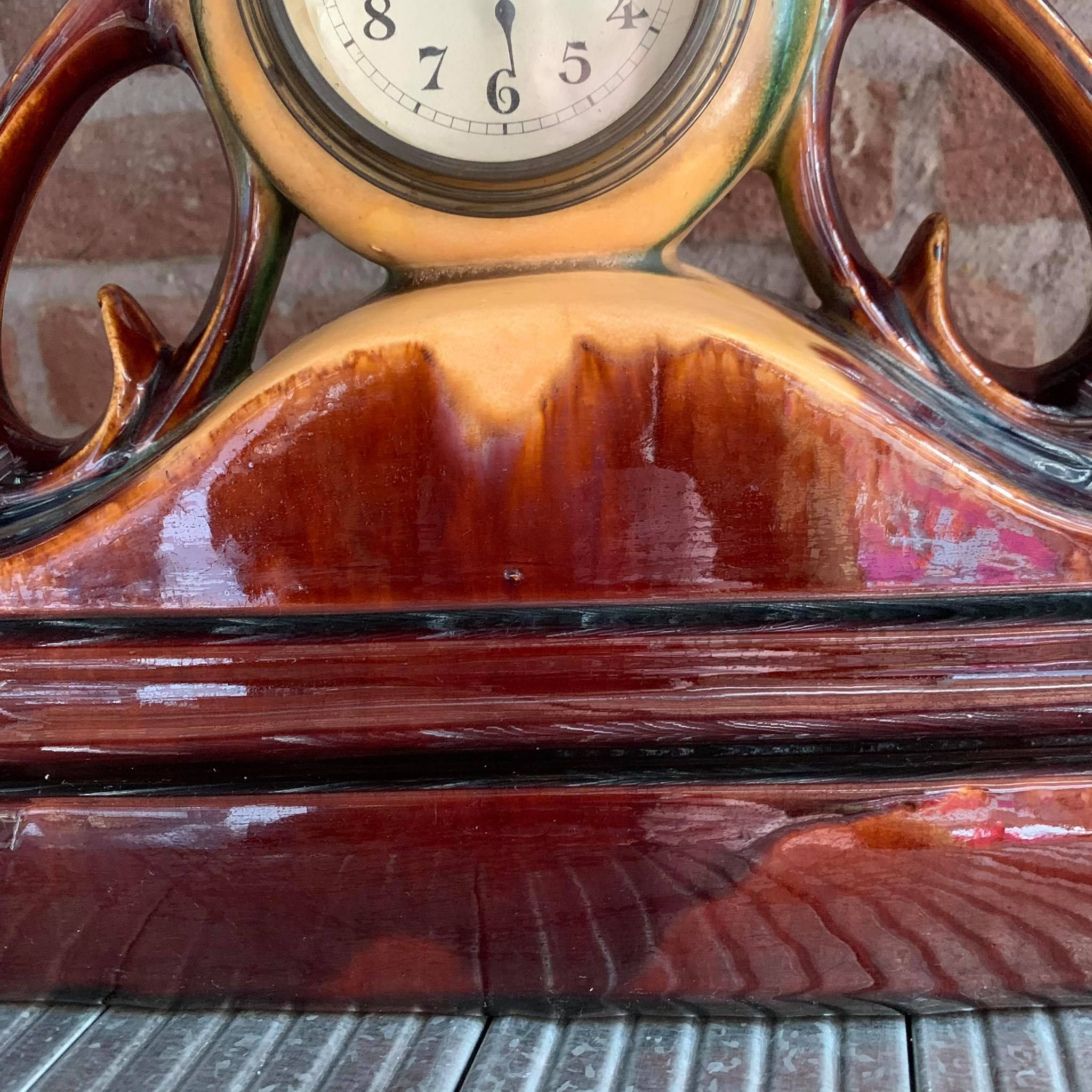 Horloge de cheminée en faïence