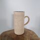 Natural terracotta carafe enamelled inside