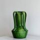 Pottery green ceramic vase with four handles.