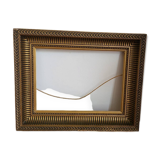 Frame with channels in wood and gilded stucco